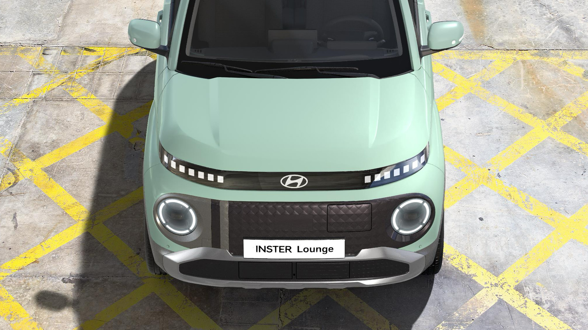 Close-up front exterior view of Hyundai INSTER Lounge in Glow Mint.