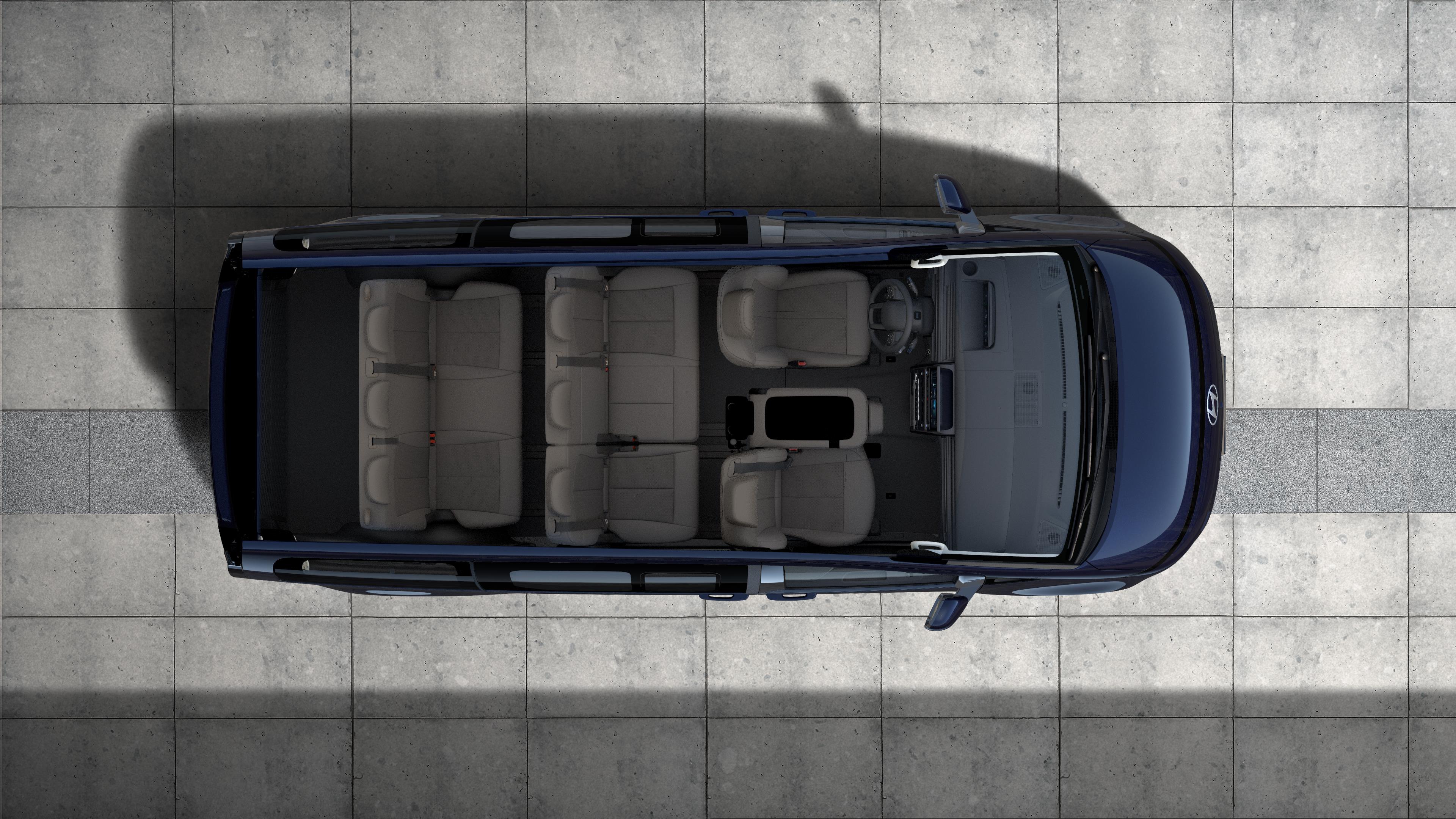 Hyundai STARIA Electric vue de dessus, avec 9 places assises et un habitacle spacieux.